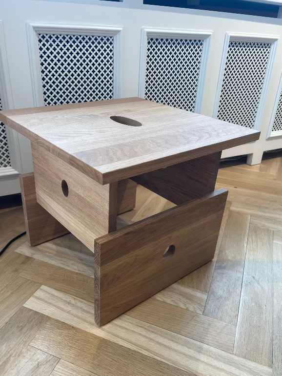 Wooden side table with a drawer on a wooden floor. HAY Wood box coffee table