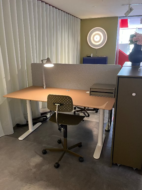Modern office setup with a desk, chair, and computer equipment at Montana commercial store in Copenhagen Denmark