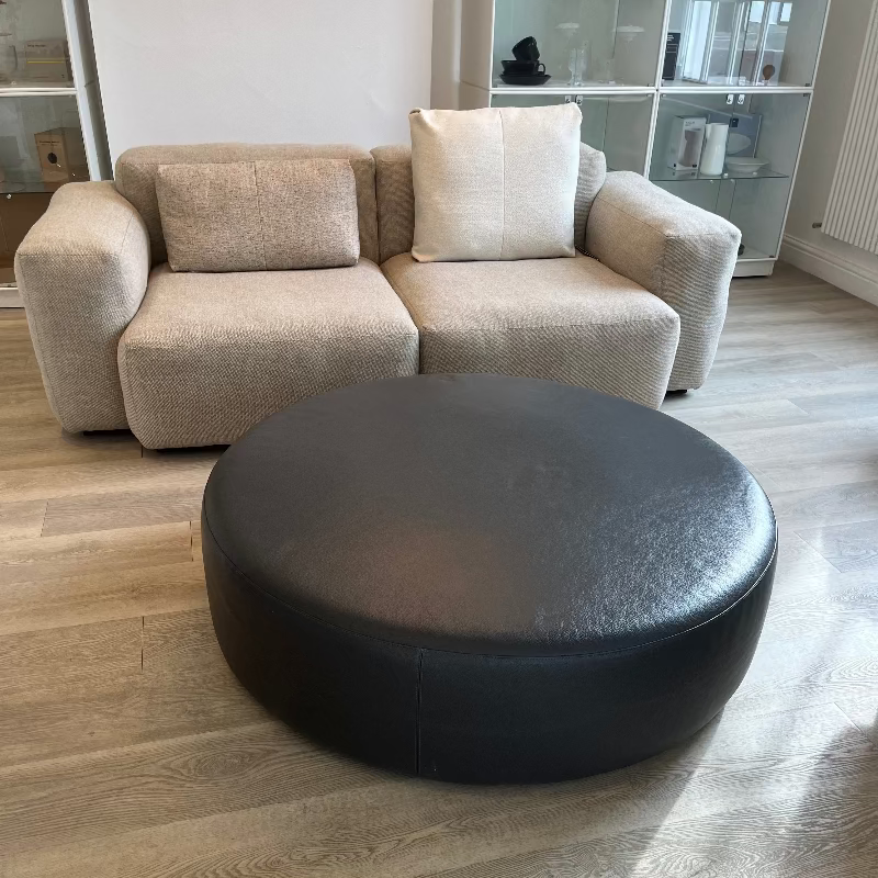 B&B Italia HL110P Large Ottoman in darkgrey brown leather and Hay Mags soft sofa in beige fabric in Innes showroom in hessle 2025