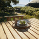Skagerak Cadence Outdoor Dining Table with Dining Chair in Untreated Teak — lifestyle, detail