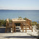 Skagerak Cadence Outdoor Bench, Dining Table and Dining Chair in Untreated Teak — lifestyle