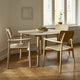  Skagerak Hven Round Oak Dining Table and Hven Oak Dining Armchair — lifestyle