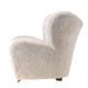 Audo The Tired Man Lounge Chair in Moonlight sheepskin – side view 3
