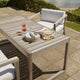 Skagerak Virkelyst Outdoor Low Dining Table — lifestyle, with Skagerak Virkelyst Outdoor Lounge Chair