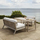 Skagerak Virkelyst Outdoor Low Dining Table — lifestyle, with Skagerak Virkelyst Outdoor 2 Seater Sofa and Lounge Chair
