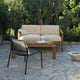 Skagerak Virkelyst Outdoor 2 Seater Sofa in Golden Yellow Stripe — lifestyle, with Cutter Bench