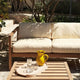 Skagerak Virkelyst Outdoor 2 Seater Sofa in Golden Yellow Stripe — lifestyle, with Skagerak Virkelyst Outdoor Coffee Table
