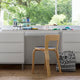 Artek 65 Dining Chair in Natural Lacquered Birch Veneer — lifestyle, bedroom