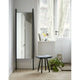 Skagerak Georg Low Stool in Black Lacquered Oak — lifestyle, with Georg Mirror