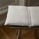 Skagerak Georg Low Stool in Untreated Oak with Linen Cushion — lifestyle, detail