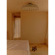 Flos Skynest Ceiling Light — lifestyle, bedroom setting