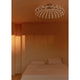 Flos Skynest Ceiling Light in Almond — lifestyle, bedroom setting