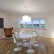 Knoll Saarinen Large Oval Dining Table with Tulip Chairs — lifestyle, dining room