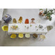 Vitra Eames Plastic Armchair RE DAW — studio, with Vitra Eames Plastic Side Chair RE DSW