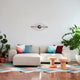  Vitra Eye Wall Clock — lifestyle, with Soft Modular Sofa, Cork Stools and L'Oiseau