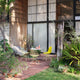 Vitra Eames Plastic Side Chair RE DSR Colours — lifestyle, with Vitra Eames Wire Chair DKR and Eames Contract Table
