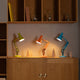 Anglepoise 90 Mini Mini Desk Lamp in Avocado Green, Sunburnt Orange and Turquoise Blue — lifestyle, group colourways