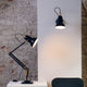 Anglepoise Original 1227 Brass Wall Lamp in Jet Black — lifestyle, with Anglepoise Original 1227 Brass Desk Lamp