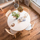 Artek Aalto Round Dining Table 90A — lifestyle, with Artek Chair 66, Bench 153A and Pendant A330S