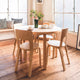 Artek 66 Dining Chair in Natural Lacquered, White HPL Seat — lifestyle, dining room
