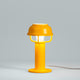 Artek Kori Table Light in Orange — studio, lit