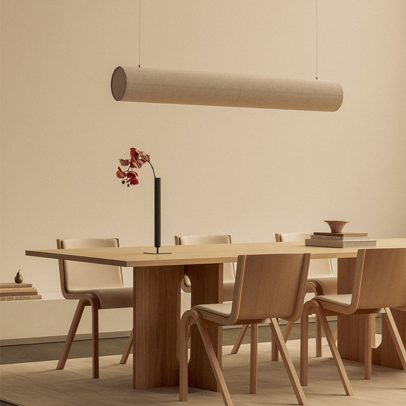 Audo Hashira Linear Pendant Light — lifestyle, with Audo Androgyne Dining Table, Audo Ready Dining Chair, and Audo Stance Vase