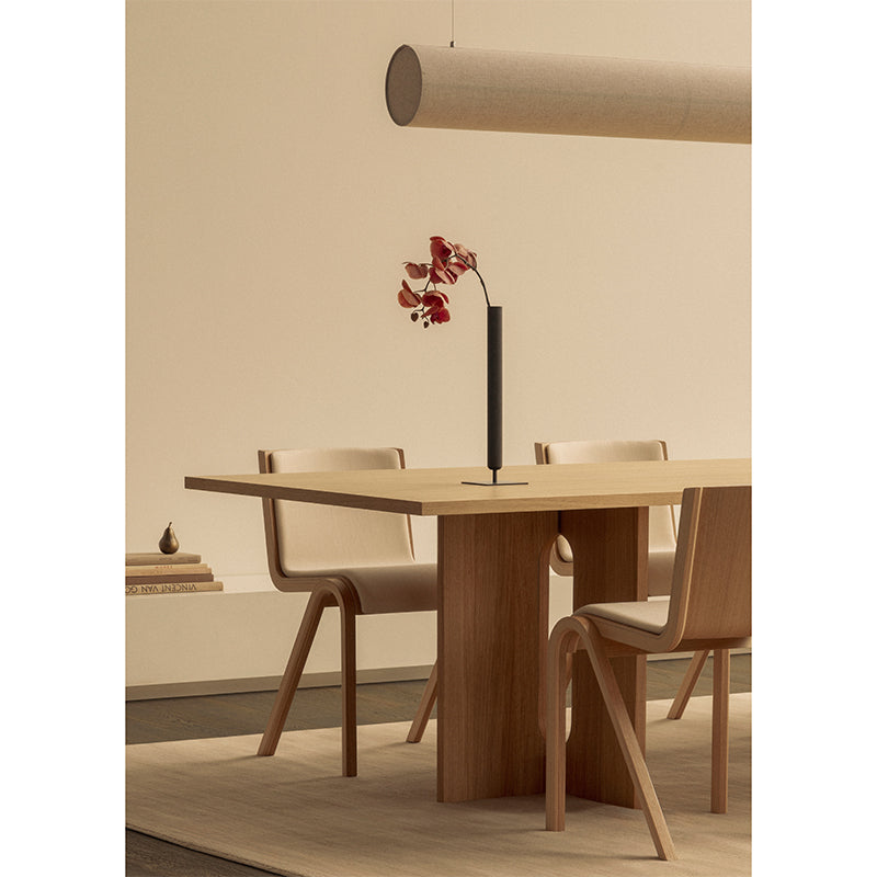 Audo Hashira Linear Pendant Light — lifestyle, with Audo Androgyne Dining Table, Audo Ready Dining Chair, and Audo Stance Vase