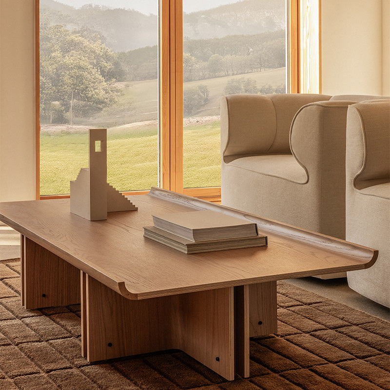 Audo Eave Seamline Lounge Chair in Siennatonal 12 — lifestyle, with Conrad Lounge Table, Tile Rug