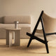 Audo Knitting Lounge Chair in Black Oak — lifestyle, with Androgyne Side Table, Column Table Lamp and Plinth Pedestal