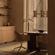 Audo Collector Chandelier 5 — lifestyle, with Harbour Dining Chair, Androgyne Dining Table, Stance Vase, Rond Bowl
