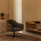 Audo Harbour Lounge Chair Swivel — lifestyle, with Plinth Tall, Crescent Shelving and Tile Rug