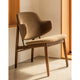 Audo The Penguin Wooden Lounge Chair Upholstered in Logan Nutmeg, Red Stained Oak — lifestyle