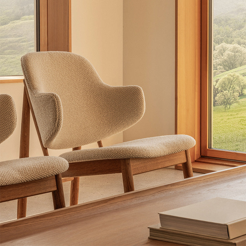 Audo The Penguin Wooden Lounge Chair Upholstered in Logan Fossil — lifestyle, with Conrad Lounge Table