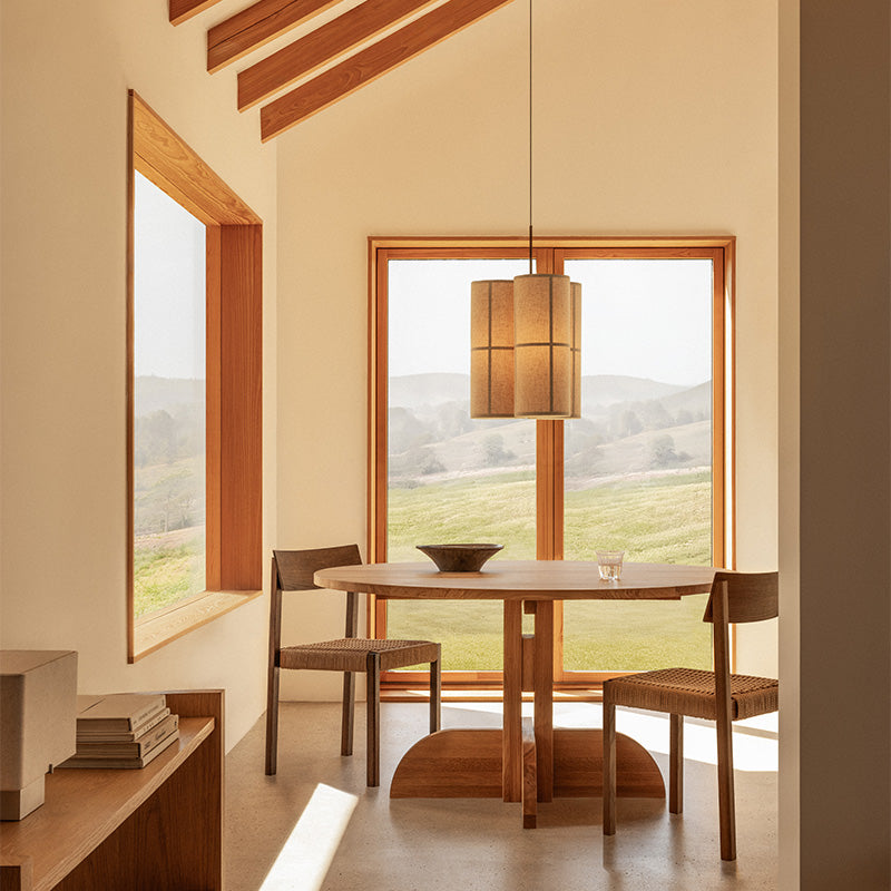 Audo Mauro Dining Chair Paper Cord Seat — lifestyle, with Audo Puffin Dining Table, Crescent Shelving, Nonna Table Lamp and Hashira Cluster Pendant