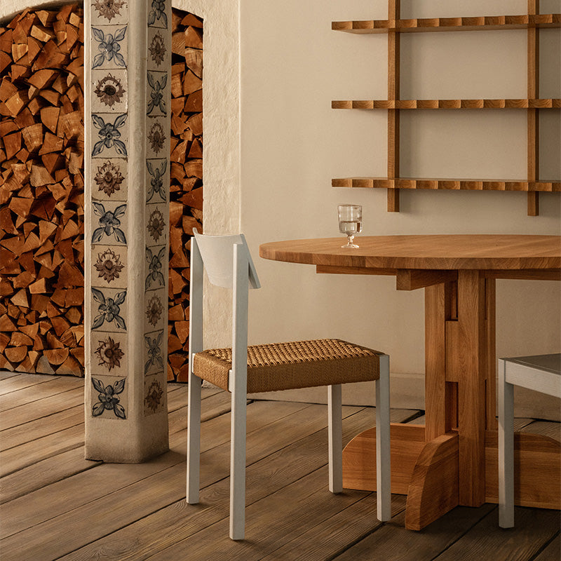 Audo Mauro Dining Chair Paper Cord Seat — lifestyle, with Audo Puffin Dining Table