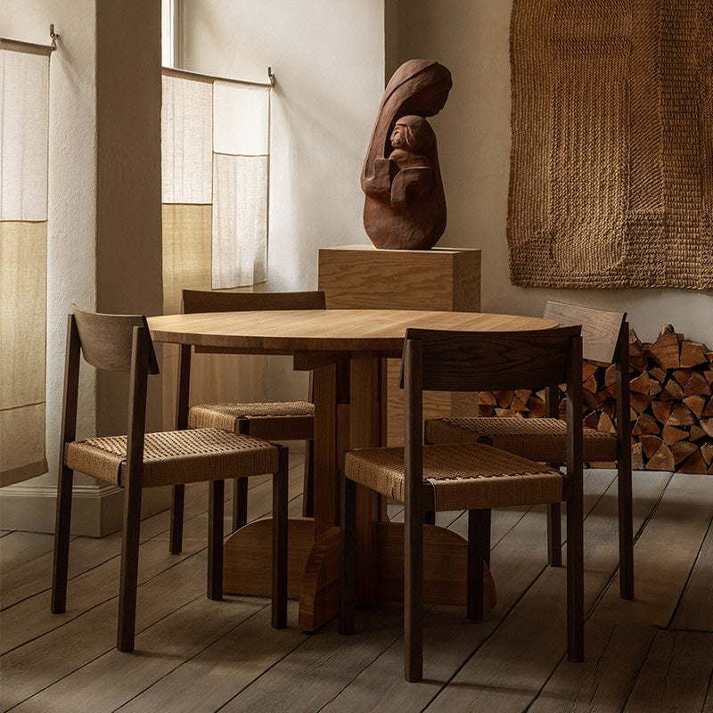 Audo Mauro Dining Chair Paper Cord Seat — lifestyle, with Audo Puffin Dining Table