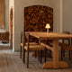 Audo Mauro Dining Chair Paper Cord Seat — lifestyle, detail, with Audo Puffin Dining Table and Admiral Portable Table Lamp