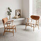 Carl Hansen CH22 Lounge Chair in Teak/Oak Oil, natural paper cord — lifestyle, living room