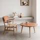 Carl Hansen CH22 Lounge Chair in Teak/Oak Oil — lifestyle, with CH008 table