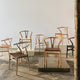 Carl Hansen CH24P Wishbone Dining Chairs in assorted wood and leather finishes — studio