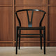 Carl Hansen CH24P Wishbone Dining Chair in Black Oak and Thor 301 — lifestyle