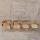 Carl Hansen CH22 Lounge Chair in Walnut/Oak Oil — studio, with CH23, CH24, CH25 and CH26