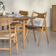 Carl Hansen CH29P Sawbuck Chair in Oak Oil — lifestyle, with CH26 Chair and CH327 Table