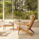 Carl Hansen CH290F Footstool with CH291 Highback Lounge Chair in Oak Oil, Serpentine 0118 — lifestyle