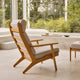 Carl Hansen CH290F Footstool with CH291 Highback Lounge Chair in Oak Oil, Serpentine 0118 — lifestyle