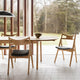 Carl Hansen CH29P Sawbuck Chair in Oak Oil — lifestyle, with CH006 Table
