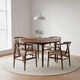 Carl Hansen CH337 Extendable Dining Table in Walnut Oil — lifestyle, with CH24 Wishbone Chair