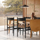 Carl Hansen CH36 Dining Chair in Oak Black — lifestyle, with CH53 and CH006 table