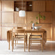 Carl Hansen CH36 Dining Chair in Oak Oil — lifestyle, with CH53 and CH006 table