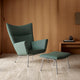 Carl Hansen CH445 Wing Chair with CH446 footrest in Passion 6101 — lifestyle